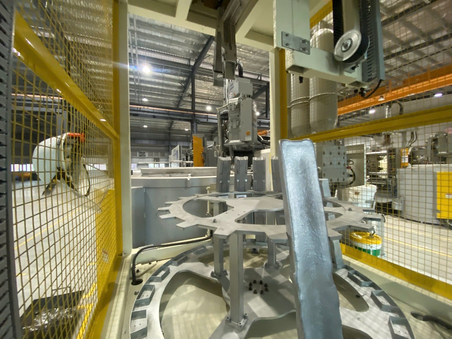 Cast metal parts staged for sample-to-production inspection